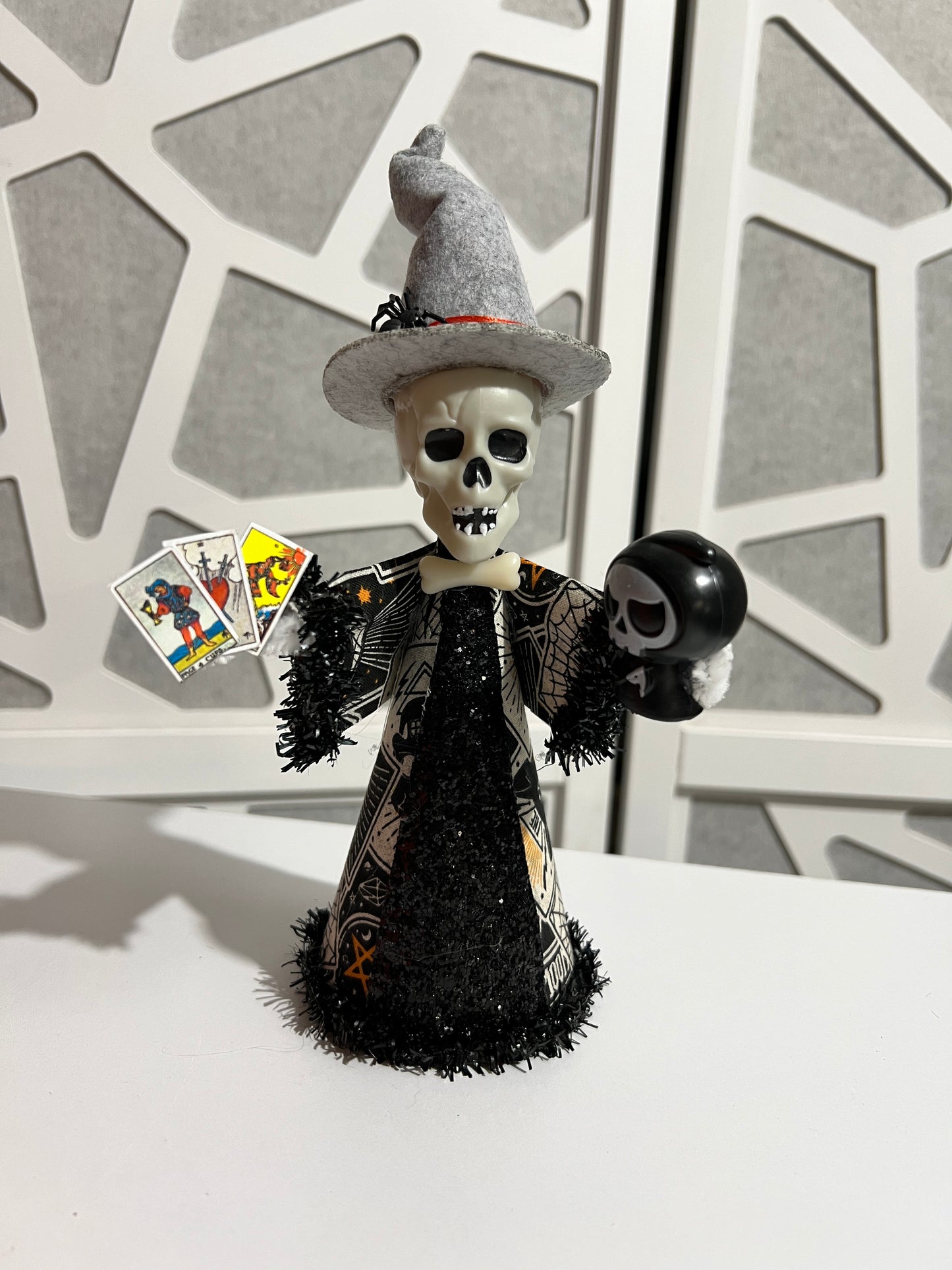 Skull head witch doll with tarot cards and ghost companion