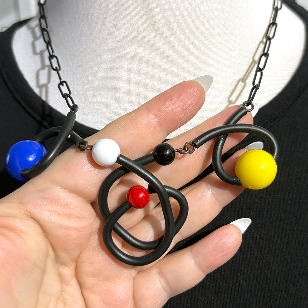 Wearable art statement necklace from Audacious Studio.