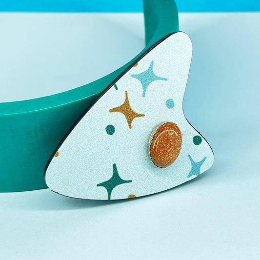 Aqua Atomic Boomerang Brooch with Goldstone