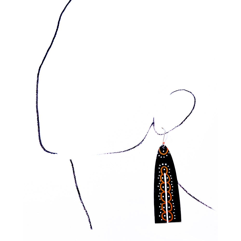 These long earrings measure are 3 1/4 inches long and feature a hand-painted design by Barbe Saint John