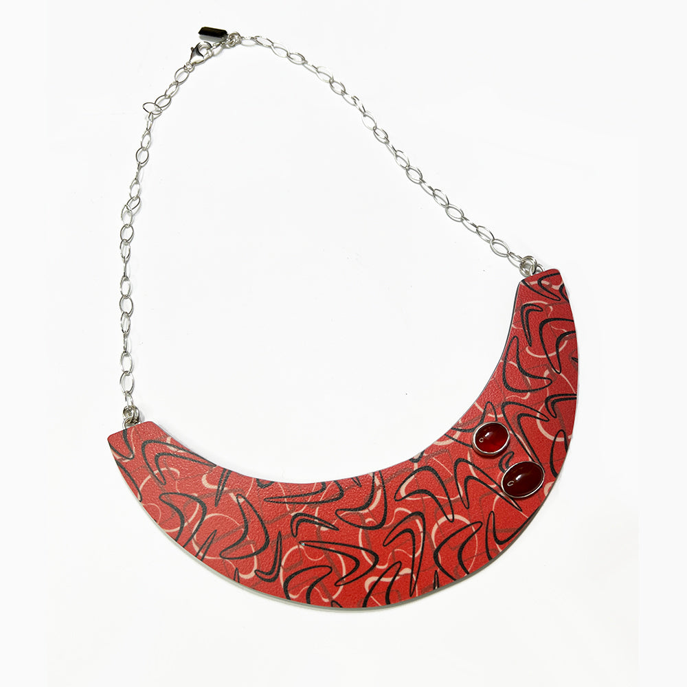 Atomic Red Boomerang Formica Bib Necklace from by Barbe jewelry.
