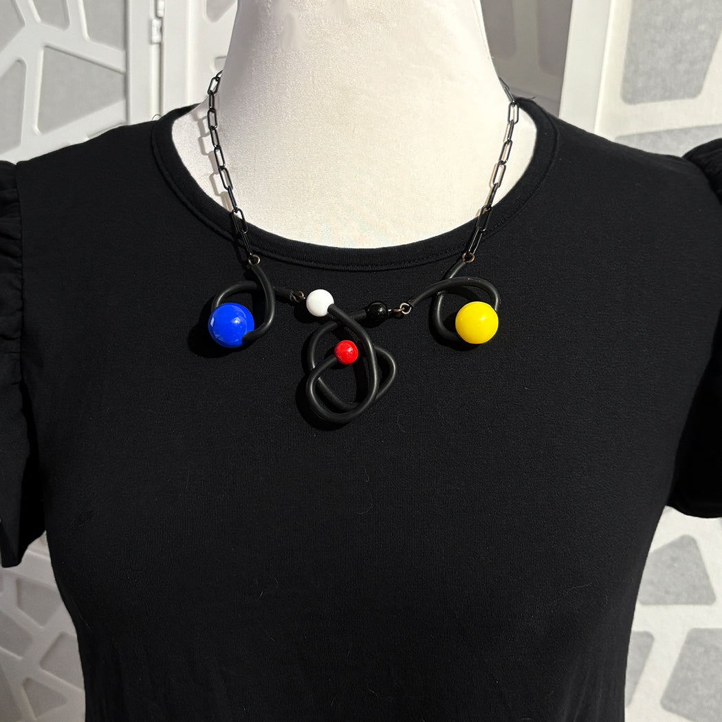 Artistic Rubber and resin bead necklace from Audacious Studio. 