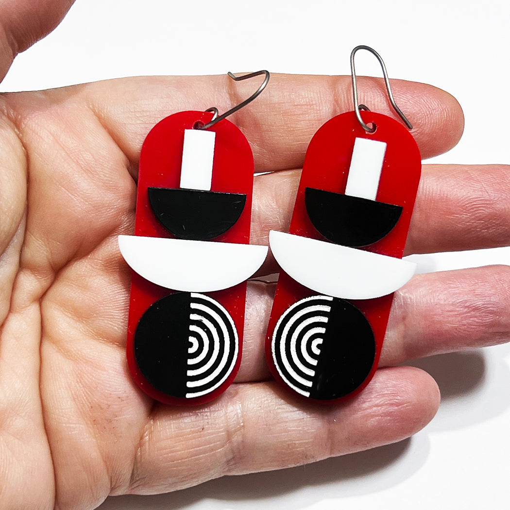 Mod 60s geometric earrings in red, black and white by Barbe Saint John.