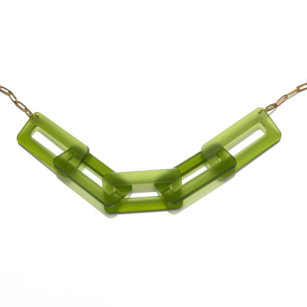 Green acrylic chain necklace 
on a white background