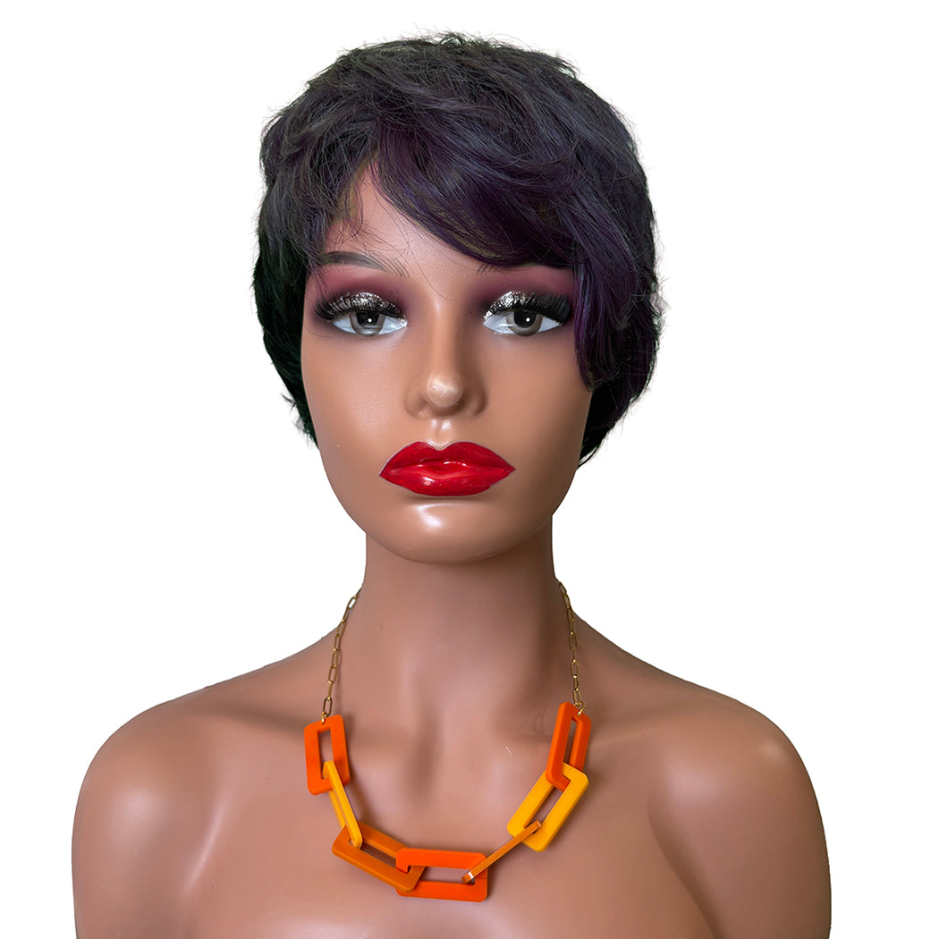Mannequin head with a black wig and red lipstick wearing an orange chain necklace on a white background