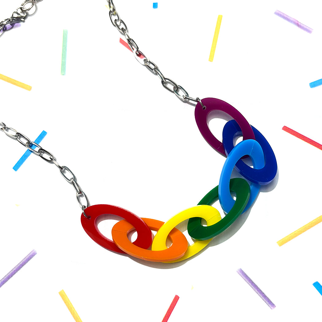 Necklace with colorful interlocking rings on a white background