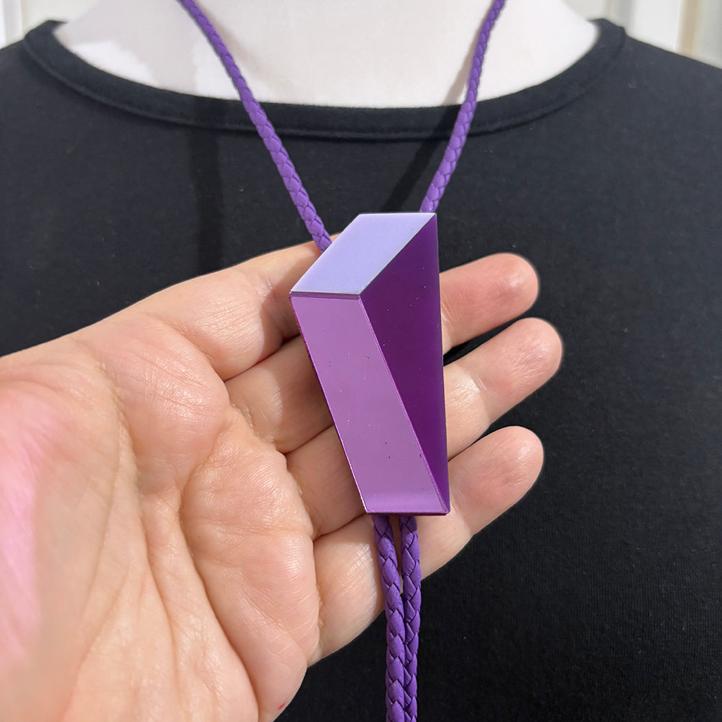 Close up detail of modern purple bolo tie