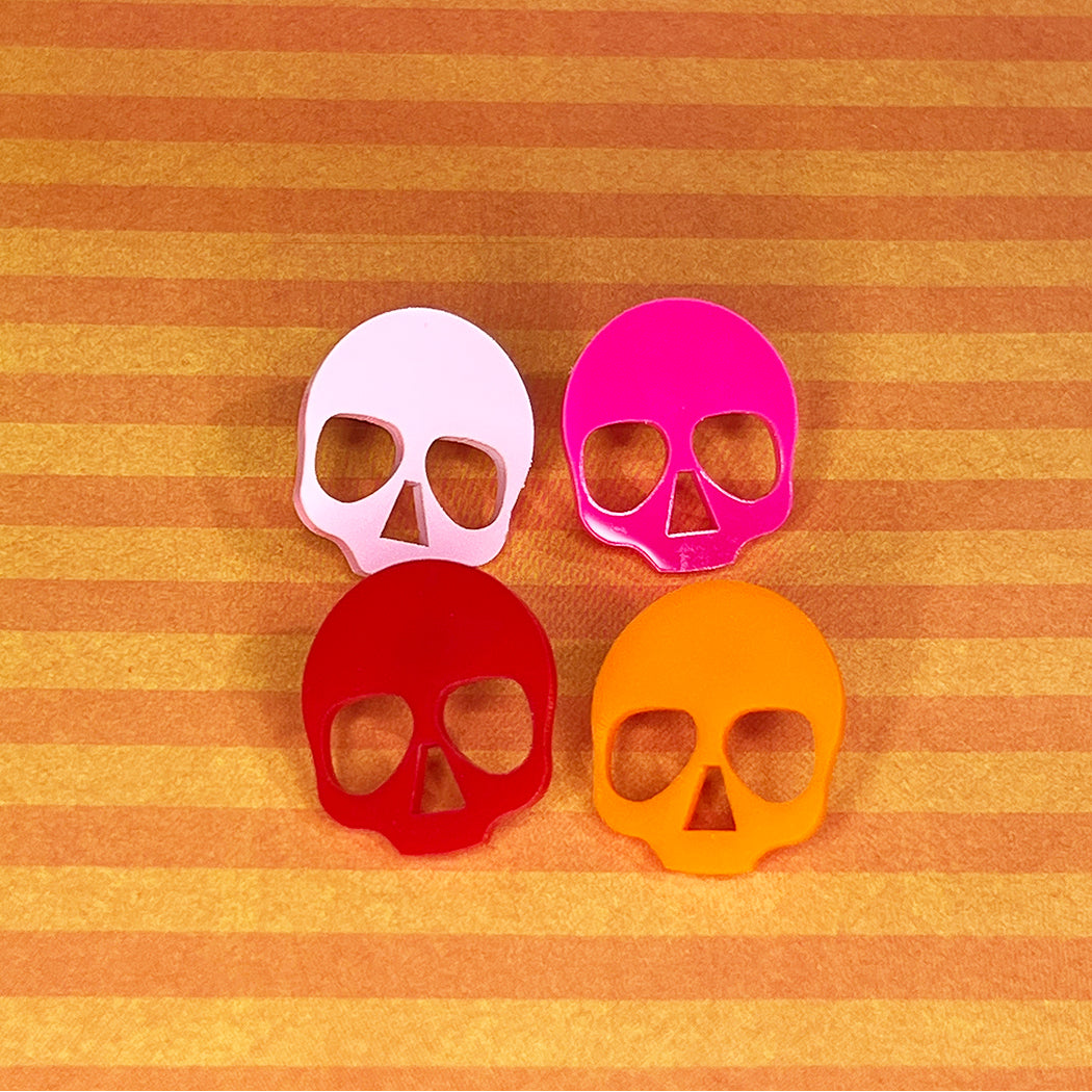 Bright colored acrylic skull stud earrings by Barbe Saint John